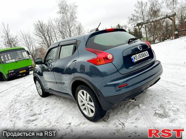 Синий Ниссан Жук, объемом двигателя 1.6 л и пробегом 125 тыс. км за 11490 $, фото 2 на Automoto.ua