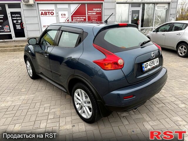 Синій Ніссан Жук, об'ємом двигуна 1.6 л та пробігом 120 тис. км за 12500 $, фото 3 на Automoto.ua