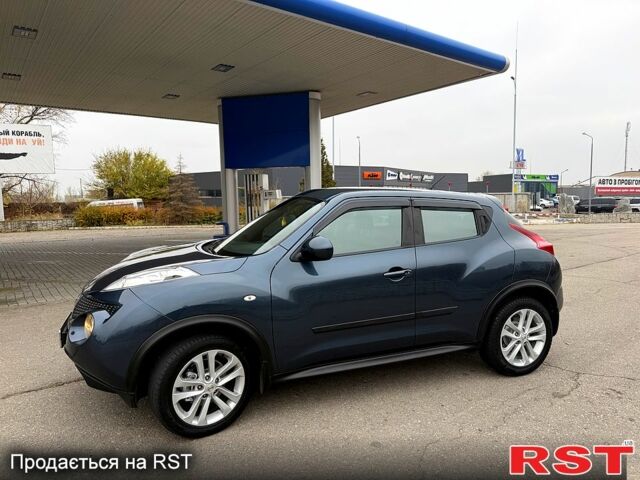 Синій Ніссан Жук, об'ємом двигуна 1.6 л та пробігом 120 тис. км за 12500 $, фото 4 на Automoto.ua