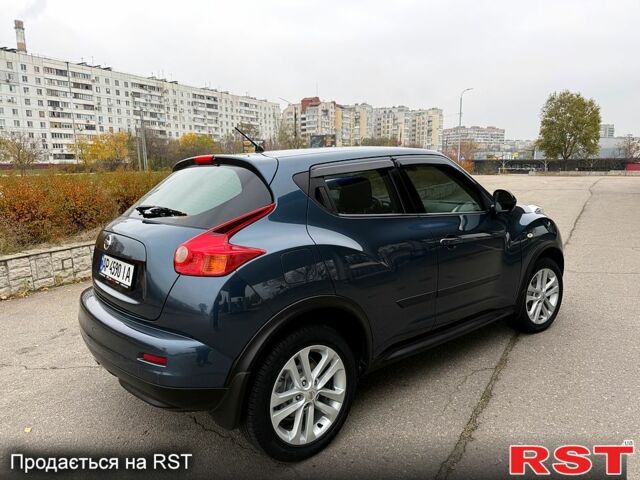 Синій Ніссан Жук, об'ємом двигуна 1.6 л та пробігом 120 тис. км за 12500 $, фото 1 на Automoto.ua