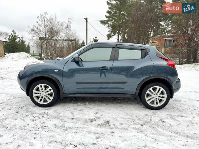 Синий Ниссан Жук, объемом двигателя 1.6 л и пробегом 125 тыс. км за 11490 $, фото 3 на Automoto.ua