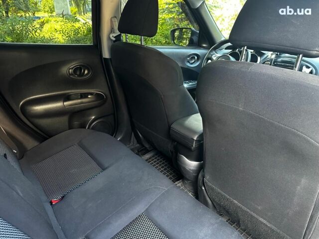 Синий Ниссан Жук, объемом двигателя 1.6 л и пробегом 177 тыс. км за 12690 $, фото 16 на Automoto.ua