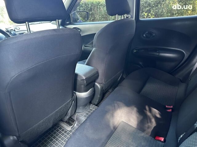 Синий Ниссан Жук, объемом двигателя 1.6 л и пробегом 177 тыс. км за 12690 $, фото 13 на Automoto.ua