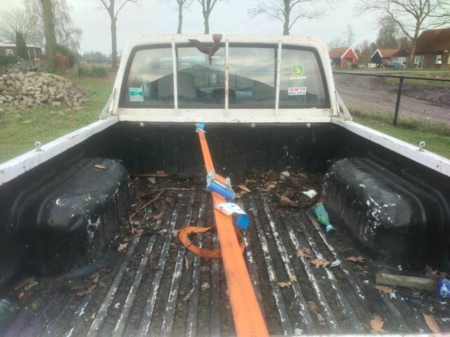 Белый Ниссан Кинг Каб, объемом двигателя 2.5 л и пробегом 256 тыс. км за 5365 $, фото 6 на Automoto.ua