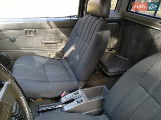 Красный Ниссан Кинг Каб, объемом двигателя 2.4 л и пробегом 400 тыс. км за 6000 $, фото 11 на Automoto.ua