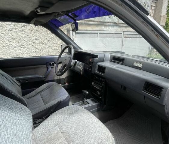 Белый Ниссан Лэнгли, объемом двигателя 1.6 л и пробегом 333 тыс. км за 750 $, фото 4 на Automoto.ua