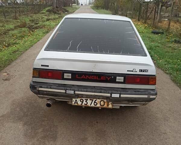 Серый Ниссан Лэнгли, объемом двигателя 0 л и пробегом 160 тыс. км за 1500 $, фото 4 на Automoto.ua