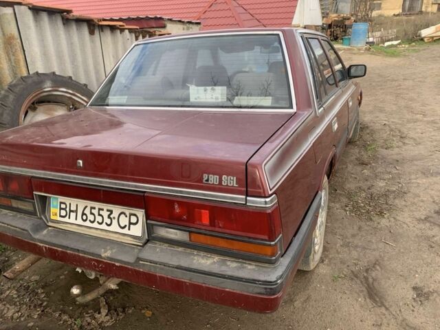 Красный Ниссан Лаурел, объемом двигателя 0 л и пробегом 100 тыс. км за 1100 $, фото 4 на Automoto.ua