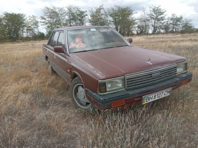 Красный Ниссан Лаурел, объемом двигателя 2.8 л и пробегом 500 тыс. км за 1300 $, фото 4 на Automoto.ua