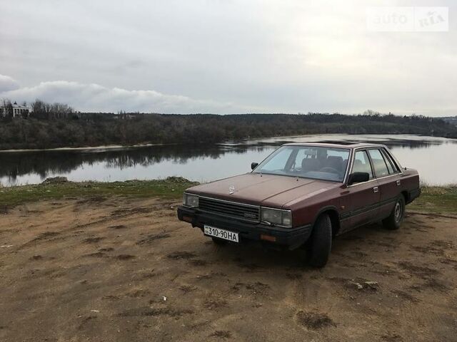 Червоний Ніссан Лаурел, об'ємом двигуна 2.4 л та пробігом 325 тис. км за 800 $, фото 3 на Automoto.ua