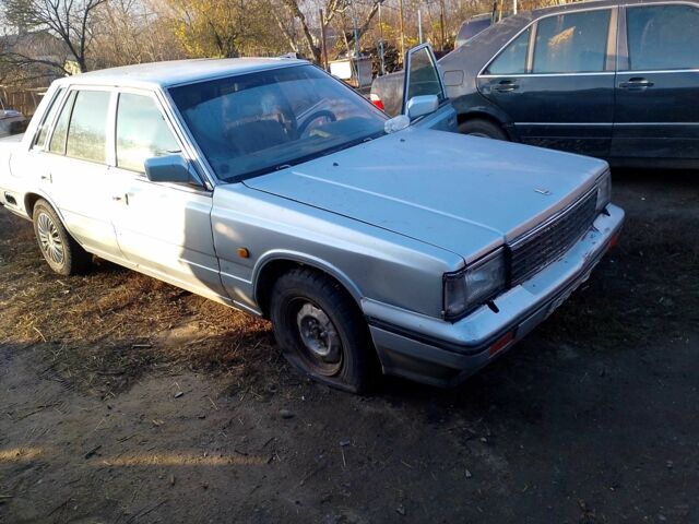 Серый Ниссан Лаурел, объемом двигателя 2.8 л и пробегом 250 тыс. км за 800 $, фото 1 на Automoto.ua