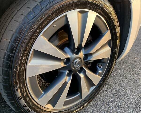 Білий Ніссан Ліф, об'ємом двигуна 0 л та пробігом 145 тис. км за 6950 $, фото 36 на Automoto.ua