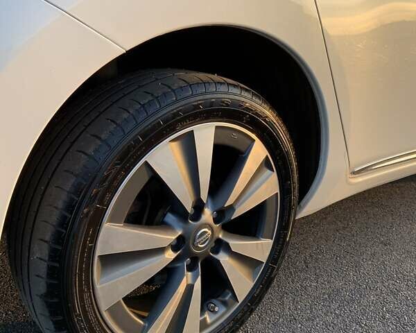 Білий Ніссан Ліф, об'ємом двигуна 0 л та пробігом 145 тис. км за 6950 $, фото 35 на Automoto.ua