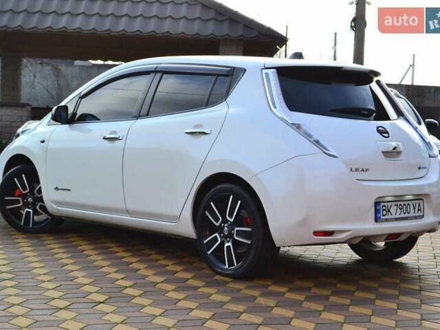 Білий Ніссан Ліф, об'ємом двигуна 0 л та пробігом 96 тис. км за 7950 $, фото 22 на Automoto.ua