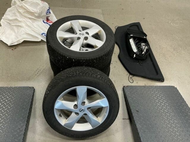 Белый Ниссан Лиф, объемом двигателя 0 л и пробегом 132 тыс. км за 7700 $, фото 13 на Automoto.ua