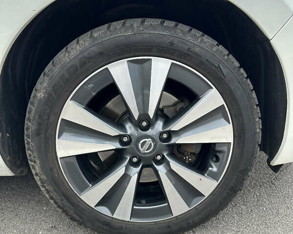 Белый Ниссан Лиф, объемом двигателя 0 л и пробегом 93 тыс. км за 8000 $, фото 3 на Automoto.ua