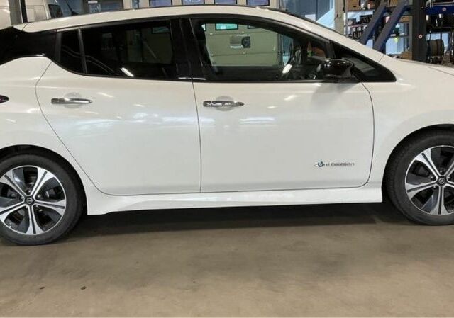 Білий Ніссан Ліф, об'ємом двигуна 0 л та пробігом 124 тис. км за 12500 $, фото 2 на Automoto.ua