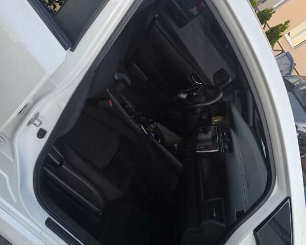 Білий Ніссан Ліф, об'ємом двигуна 0 л та пробігом 129 тис. км за 11300 $, фото 7 на Automoto.ua