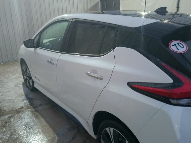 Белый Ниссан Лиф, объемом двигателя 0 л и пробегом 124 тыс. км за 15000 $, фото 3 на Automoto.ua