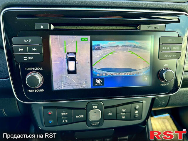 Белый Ниссан Лиф, объемом двигателя 0.13 л и пробегом 44 тыс. км за 12400 $, фото 9 на Automoto.ua