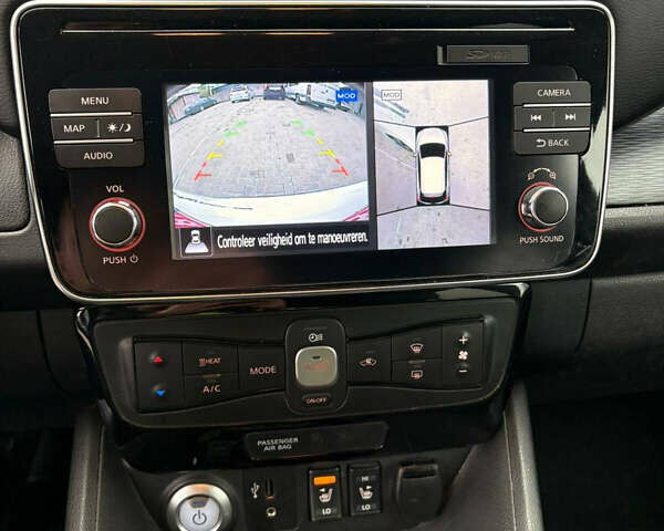 Білий Ніссан Ліф, об'ємом двигуна 0 л та пробігом 150 тис. км за 10400 $, фото 24 на Automoto.ua