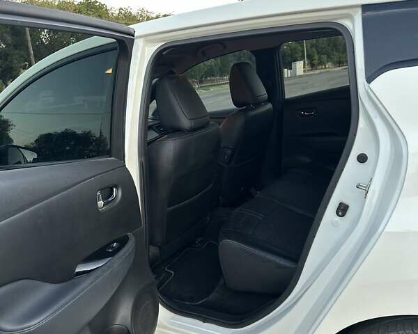 Білий Ніссан Ліф, об'ємом двигуна 0 л та пробігом 83 тис. км за 14000 $, фото 4 на Automoto.ua