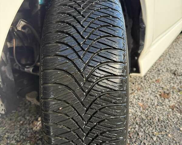 Білий Ніссан Ліф, об'ємом двигуна 0 л та пробігом 118 тис. км за 15000 $, фото 7 на Automoto.ua