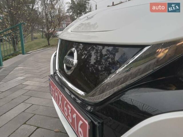 Білий Ніссан Ліф, об'ємом двигуна 0 л та пробігом 81 тис. км за 16990 $, фото 57 на Automoto.ua