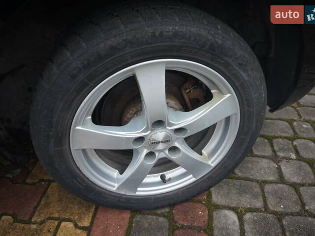 Черный Ниссан Лиф, объемом двигателя 0 л и пробегом 121 тыс. км за 4333 $, фото 62 на Automoto.ua