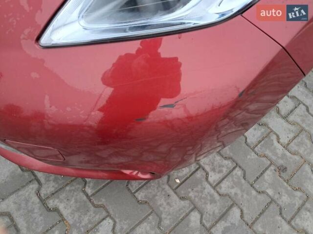 Красный Ниссан Лиф, объемом двигателя 0 л и пробегом 129 тыс. км за 4800 $, фото 5 на Automoto.ua