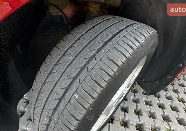 Красный Ниссан Лиф, объемом двигателя 0 л и пробегом 142 тыс. км за 6500 $, фото 8 на Automoto.ua