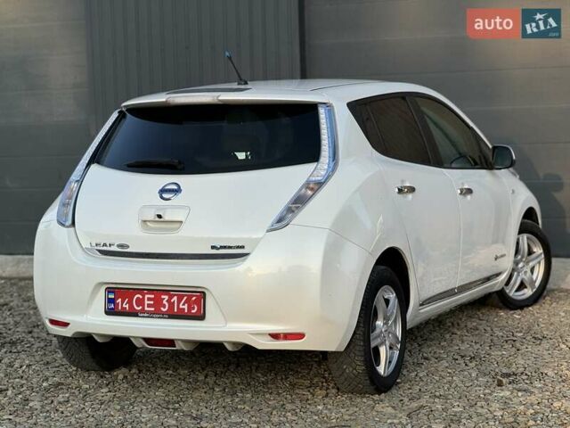 Червоний Ніссан Ліф, об'ємом двигуна 0 л та пробігом 90 тис. км за 5999 $, фото 28 на Automoto.ua