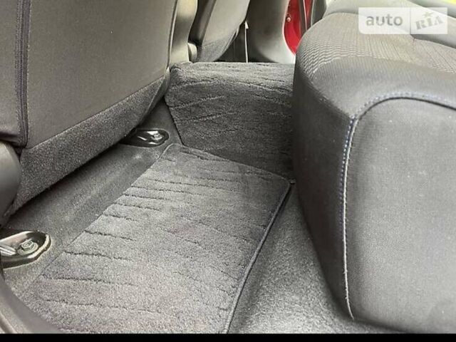 Красный Ниссан Лиф, объемом двигателя 0 л и пробегом 122 тыс. км за 4950 $, фото 8 на Automoto.ua