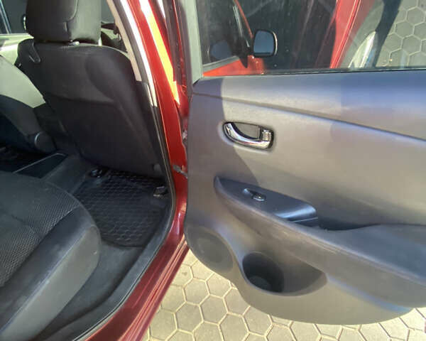 Красный Ниссан Лиф, объемом двигателя 0 л и пробегом 159 тыс. км за 5300 $, фото 14 на Automoto.ua