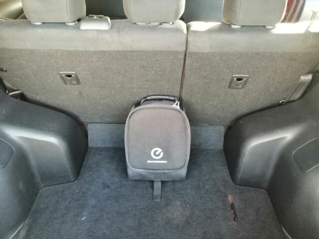 Красный Ниссан Лиф, объемом двигателя 0 л и пробегом 104 тыс. км за 7000 $, фото 19 на Automoto.ua