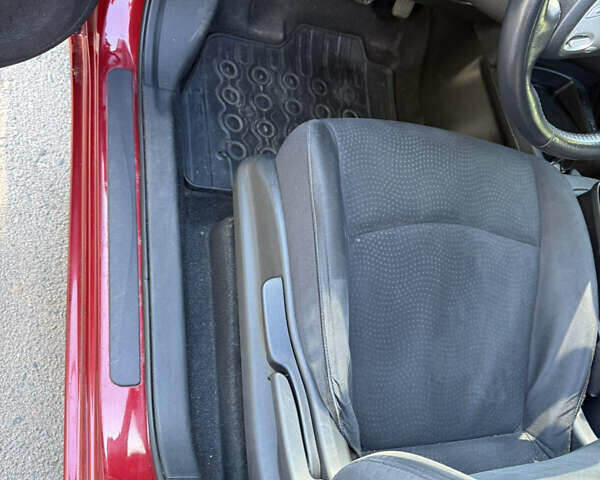 Красный Ниссан Лиф, объемом двигателя 0 л и пробегом 144 тыс. км за 6500 $, фото 9 на Automoto.ua