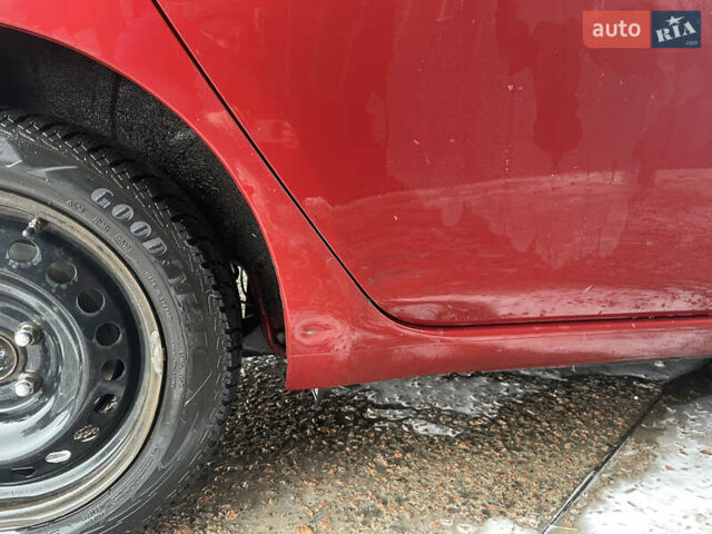 Красный Ниссан Лиф, объемом двигателя 0 л и пробегом 156 тыс. км за 6500 $, фото 1 на Automoto.ua