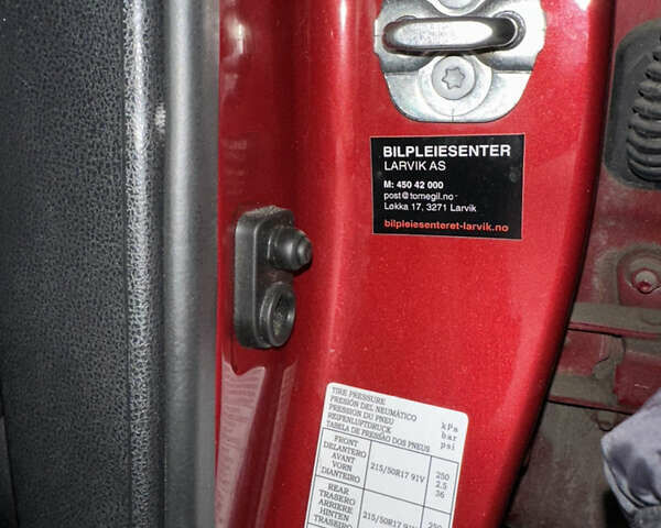 Красный Ниссан Лиф, объемом двигателя 0 л и пробегом 125 тыс. км за 7199 $, фото 2 на Automoto.ua