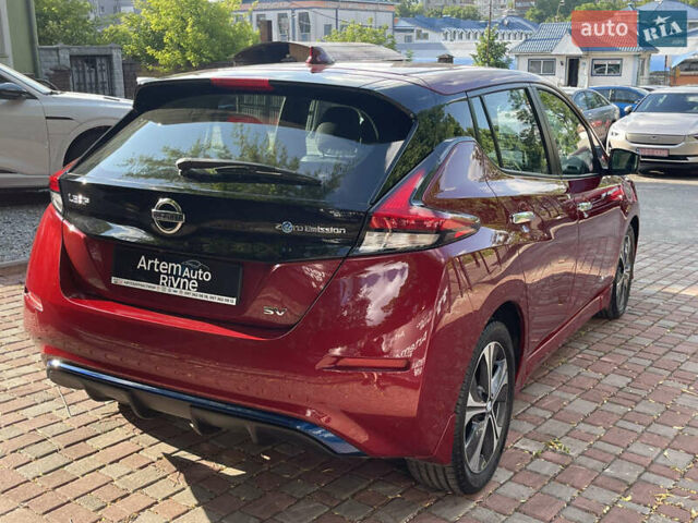 Красный Ниссан Лиф, объемом двигателя 0 л и пробегом 117 тыс. км за 12000 $, фото 4 на Automoto.ua