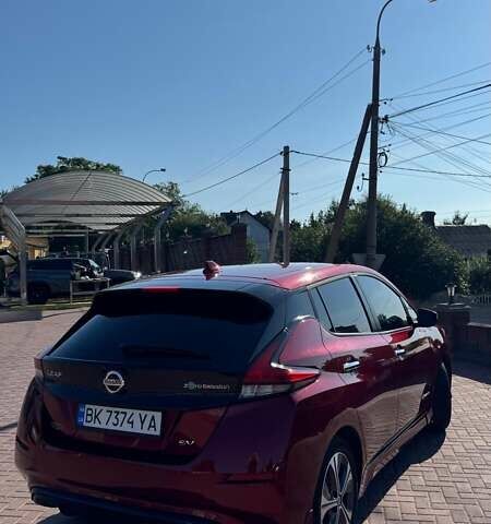 Красный Ниссан Лиф, объемом двигателя 0 л и пробегом 90 тыс. км за 11500 $, фото 6 на Automoto.ua