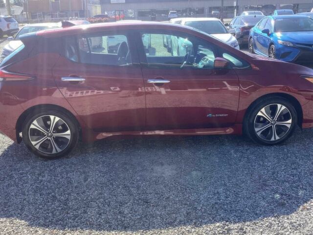 Красный Ниссан Лиф, объемом двигателя 0 л и пробегом 31 тыс. км за 13000 $, фото 3 на Automoto.ua