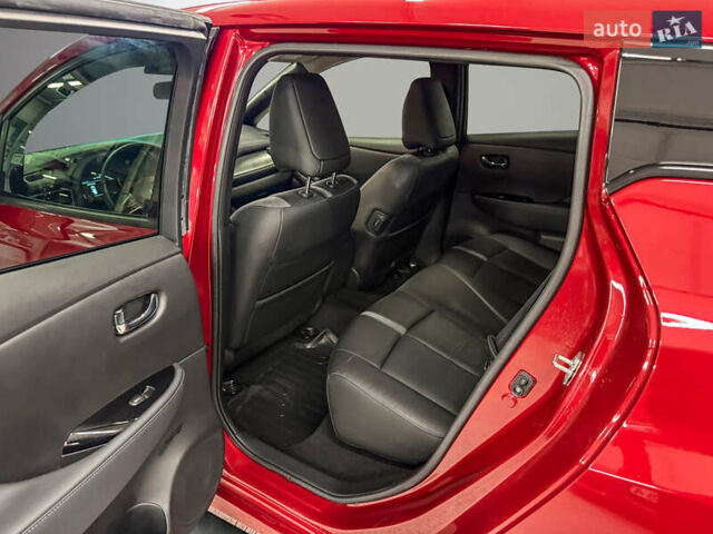 Красный Ниссан Лиф, объемом двигателя 0 л и пробегом 25 тыс. км за 8500 $, фото 19 на Automoto.ua