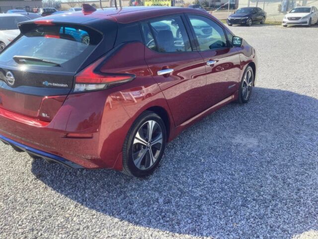 Красный Ниссан Лиф, объемом двигателя 0 л и пробегом 31 тыс. км за 13000 $, фото 4 на Automoto.ua