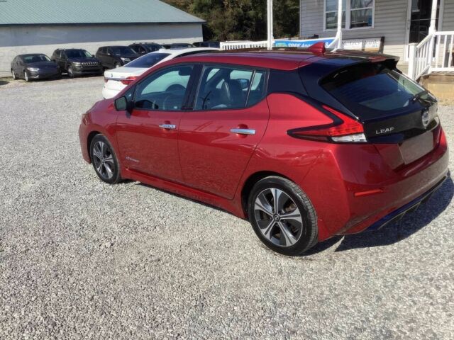 Красный Ниссан Лиф, объемом двигателя 0 л и пробегом 31 тыс. км за 13000 $, фото 6 на Automoto.ua