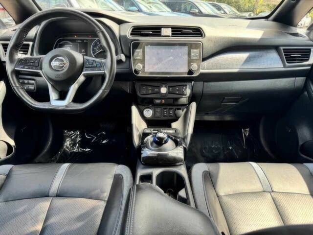 Красный Ниссан Лиф, объемом двигателя 0 л и пробегом 48 тыс. км за 13200 $, фото 6 на Automoto.ua