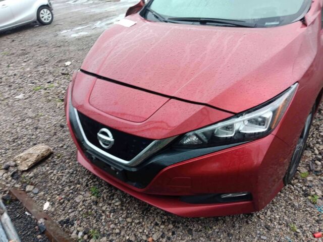 Красный Ниссан Лиф, объемом двигателя 0 л и пробегом 92 тыс. км за 12250 $, фото 4 на Automoto.ua