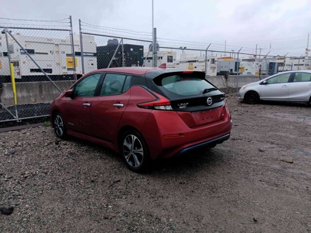 Красный Ниссан Лиф, объемом двигателя 0 л и пробегом 92 тыс. км за 12250 $, фото 2 на Automoto.ua