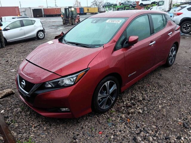 Красный Ниссан Лиф, объемом двигателя 0 л и пробегом 92 тыс. км за 12250 $, фото 1 на Automoto.ua