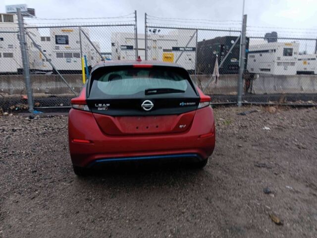 Красный Ниссан Лиф, объемом двигателя 0 л и пробегом 92 тыс. км за 12250 $, фото 3 на Automoto.ua