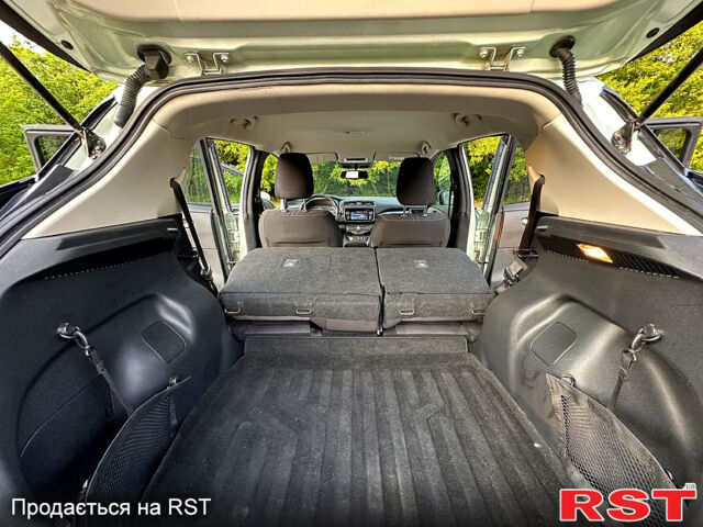 Ниссан Лиф, объемом двигателя 0.11 л и пробегом 136 тыс. км за 11800 $, фото 10 на Automoto.ua